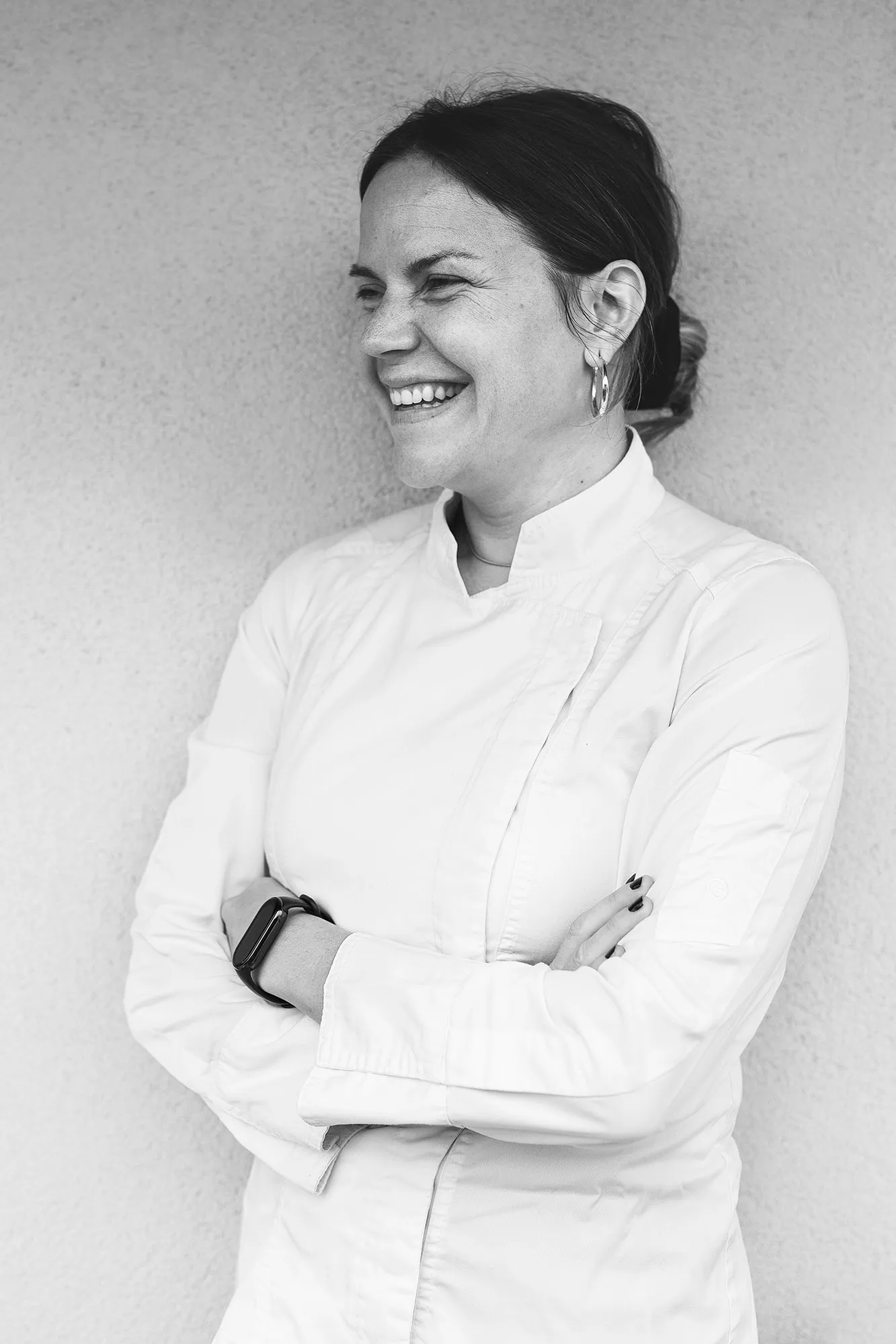 Portrait of chef Sabrina Morandi in a white chef jacket